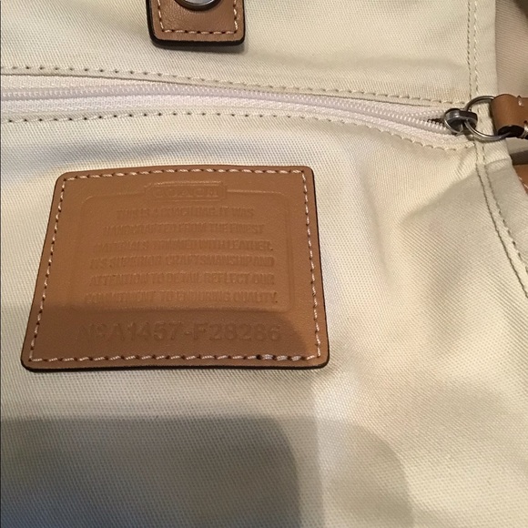 Like new Coach tote bag, beautiful deep yellow color with brown leather. - Picture 3 of 3